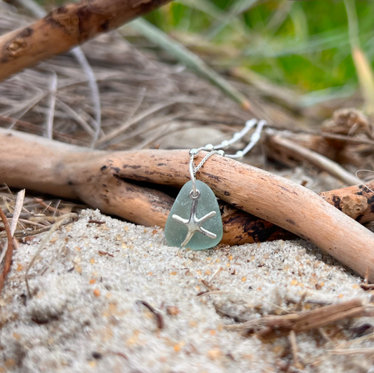 Seafoam sea glass and sterling silver starfish pendant by Mornington Sea Glass. Hangs on a 40cm + 5cm extension ball detail chain.
