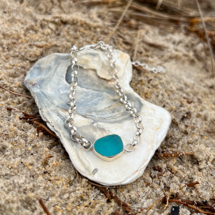Ocean teal sea glass set in silver bracelet by Mornington Sea Glass. 17cm length with 5cm extension chain.