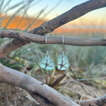 Soft blue sea glass and sterling silver sea star earrings  by Mornington Sea Glass. 