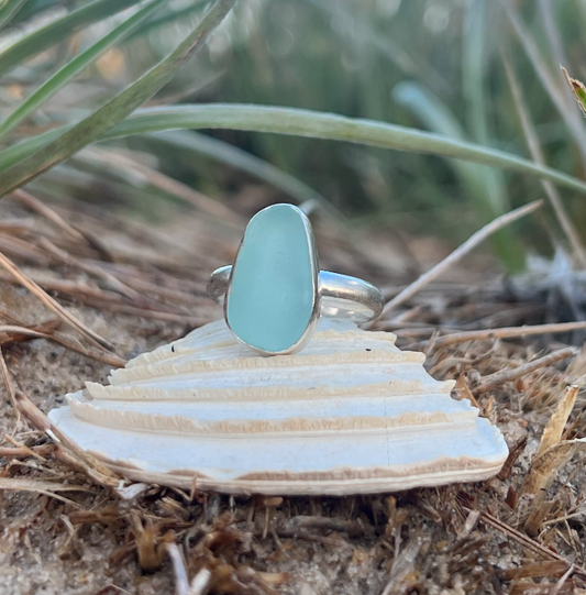 Pale blue sea glass set in silver ring by Mornington Sea Glass. Size 7 3/4.