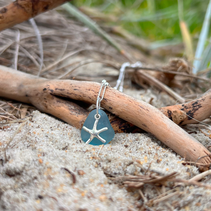 Ocean teal sea glass and sterling silver starfish pendant by Mornington Sea Glass. Hangs on a 40cm + 5cm extension ball detail chain.