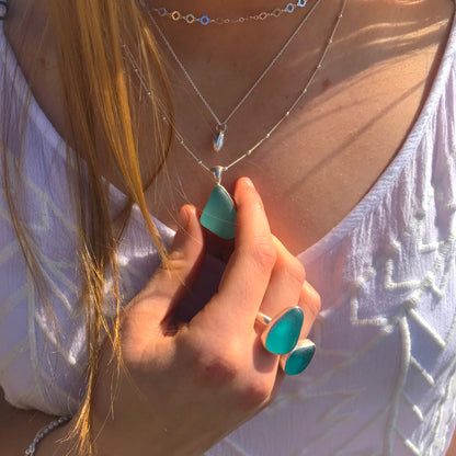 Model wearing sea glass pendant and rings by Mornington Sea Glass