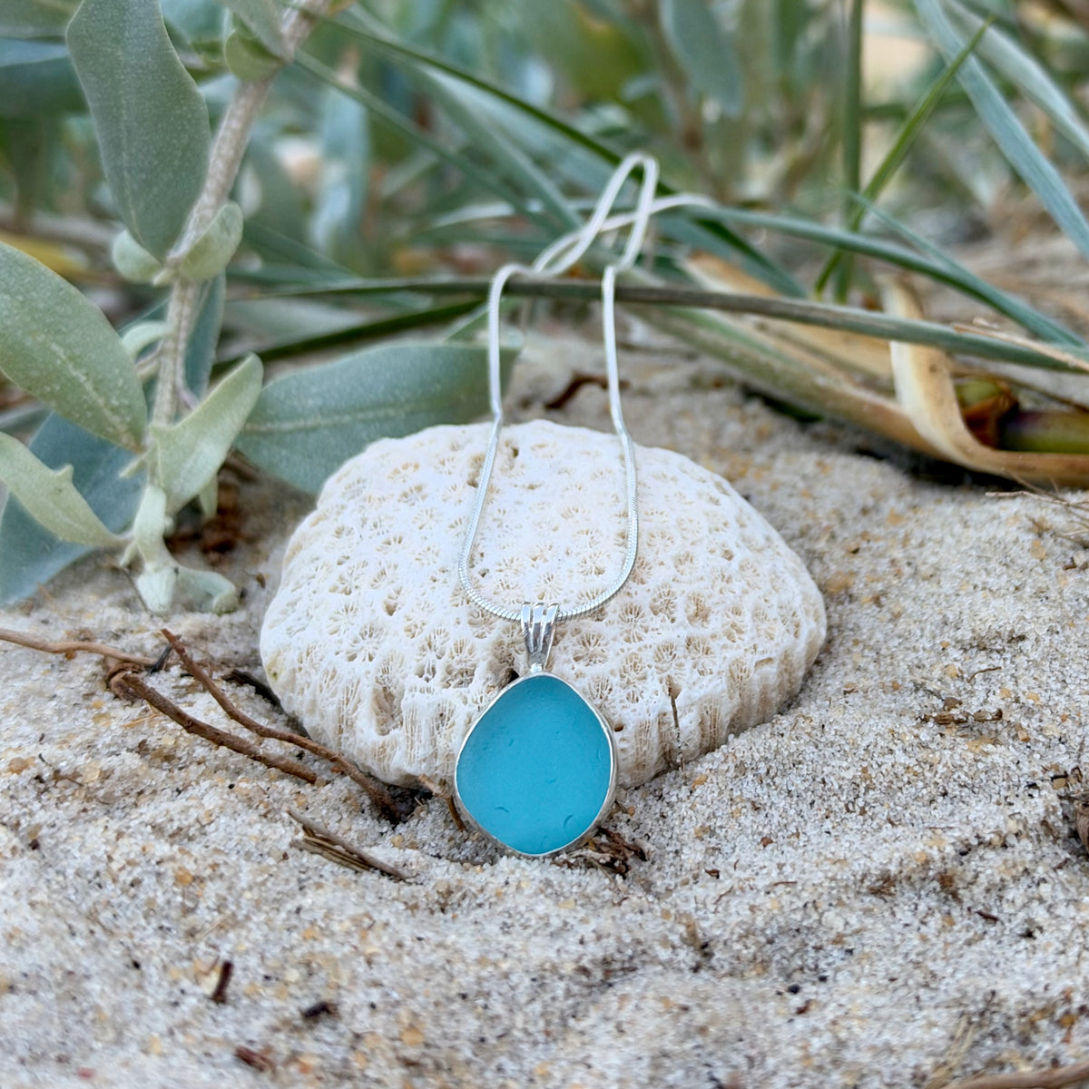 Ocean Teal sea glass handset in Argentium silver pendant by Mornington Sea Glass. Hangs on a 40 or 45cm sterling silver snake chain. 